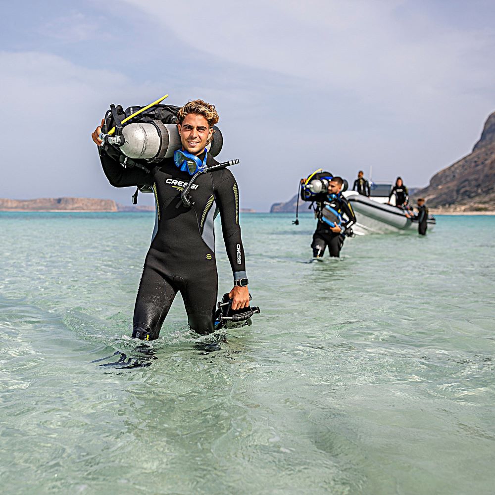 Diver entering the water with calm confidence
